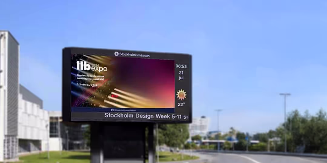 Digital utomhusskärm vid Stockholmsmässan som visar reklam för LLB Expo